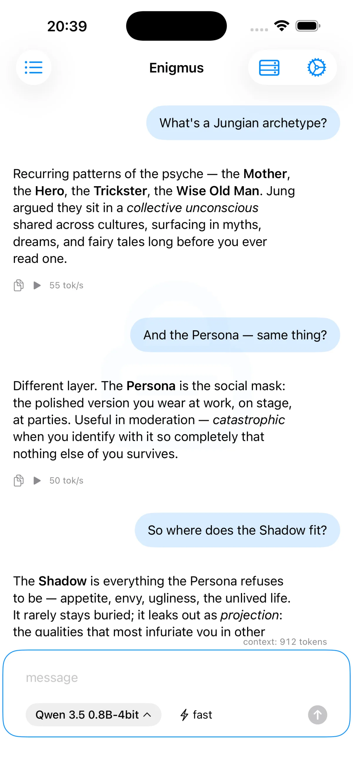 The Enigmus chat screen on iPhone: a multi-turn conversation about Jungian archetypes, with the two-row input bar underneath holding the model picker and the thinking toggle